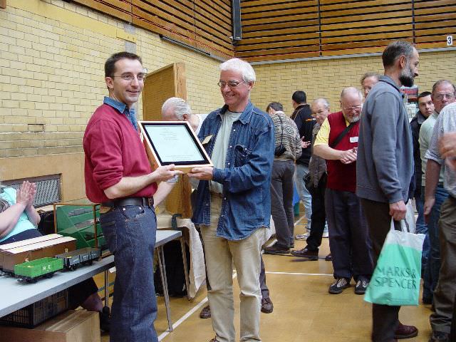 Alain Duchesne is presented the 2003 Reinier Hendriksen Trophy by Chris O'Donoghue - Image © Mick Thornton