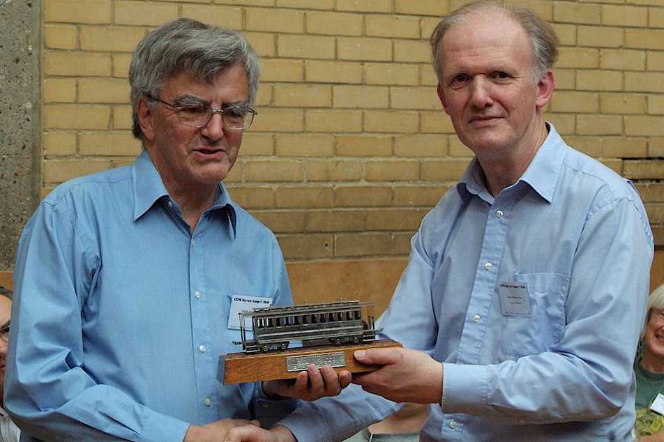Steve Howe is presented the 2011 David Lloyd Trophy by Andrew Burnham