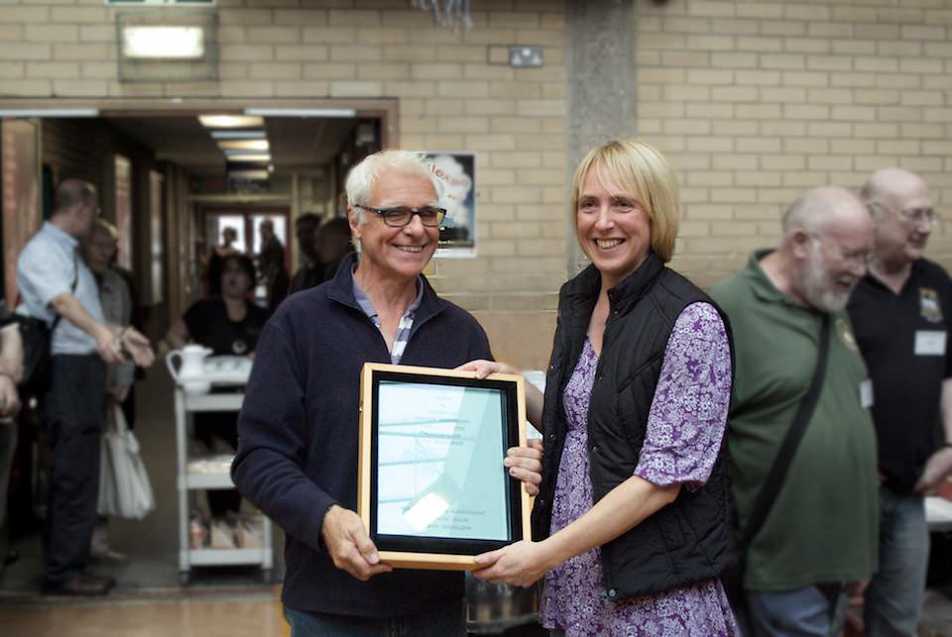 Helen Kean is presented the 2011 Reinier Hendriksen Trophy by Chris O'Donoghue