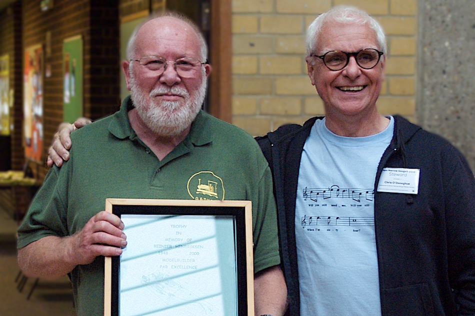 Richard Glover is presented the 2014 Reinier Hendriksen Trophy by Chris O'Donoghue