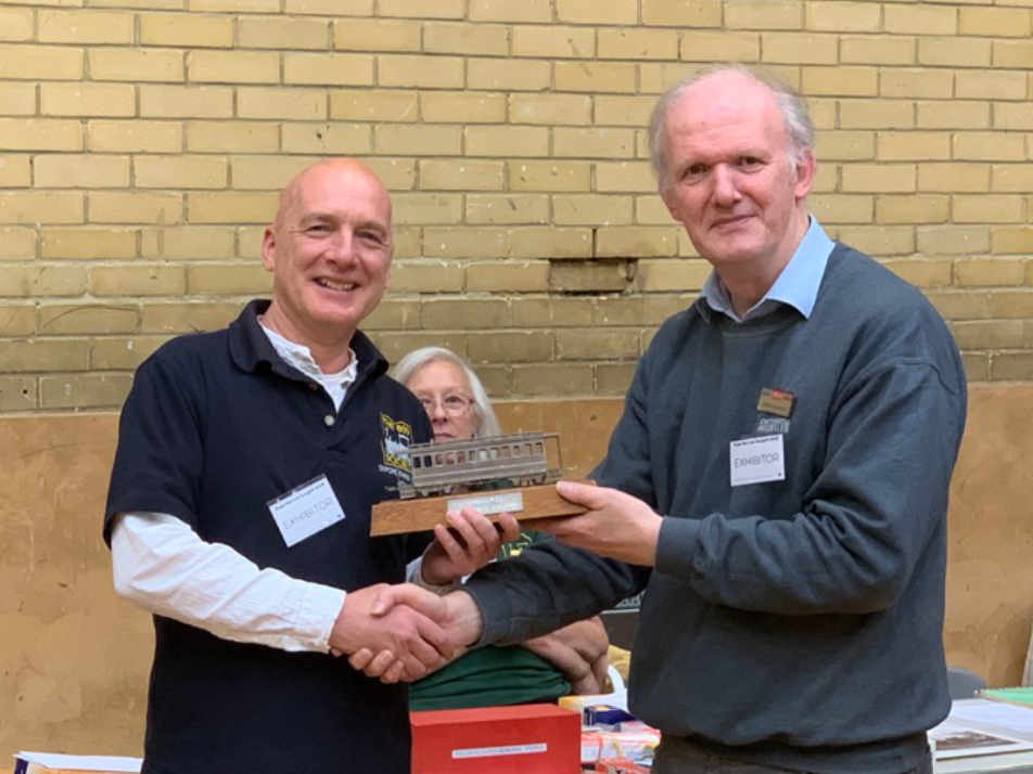 John Wilkes is presented the 2016 David Lloyd Trophy by Andrew Burnham