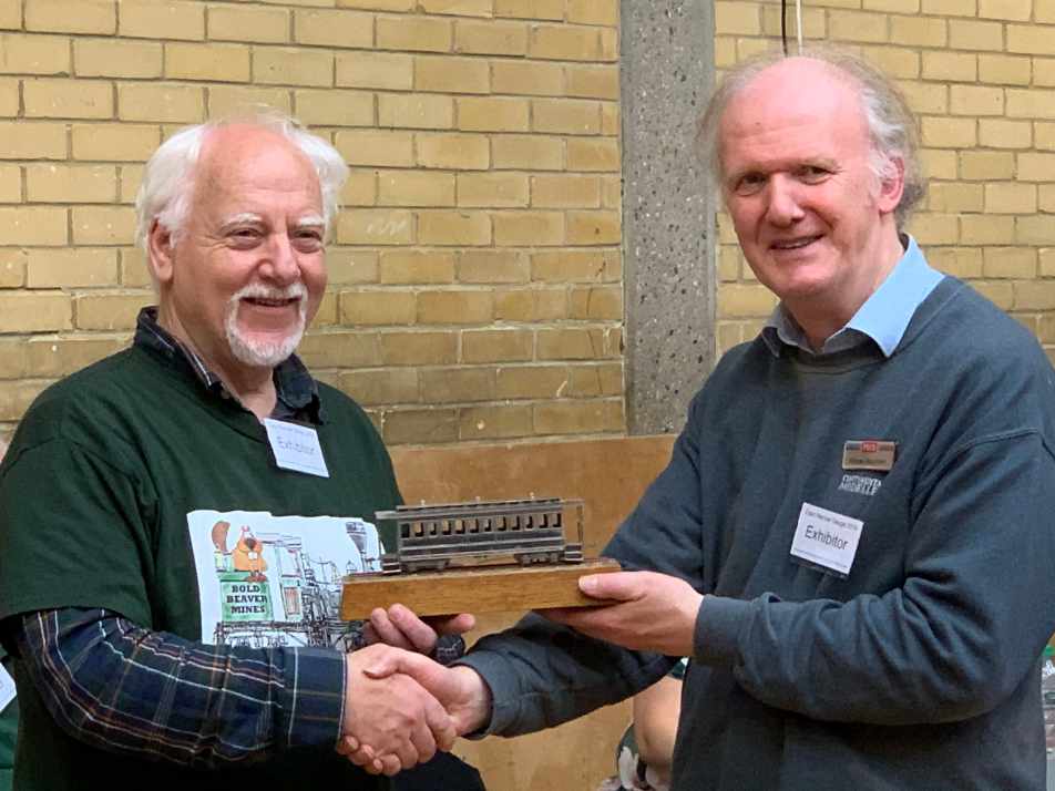 Steve Waterfield is presented the 2019 David Lloyd Trophy by Andrew Burnham